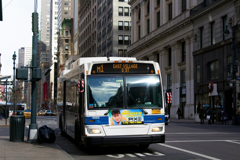 a bus traveling down the street